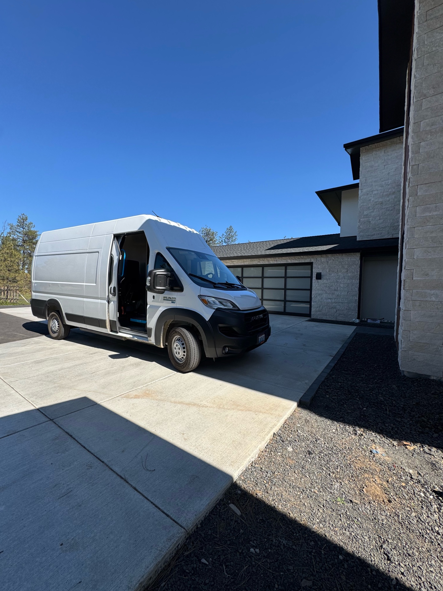 Dr. Electric van on site at luxury custom home with pool